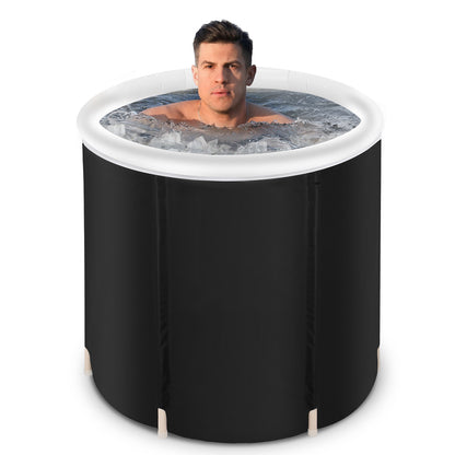 Athlete using portable ice bath tub for cold therapy recovery after workout